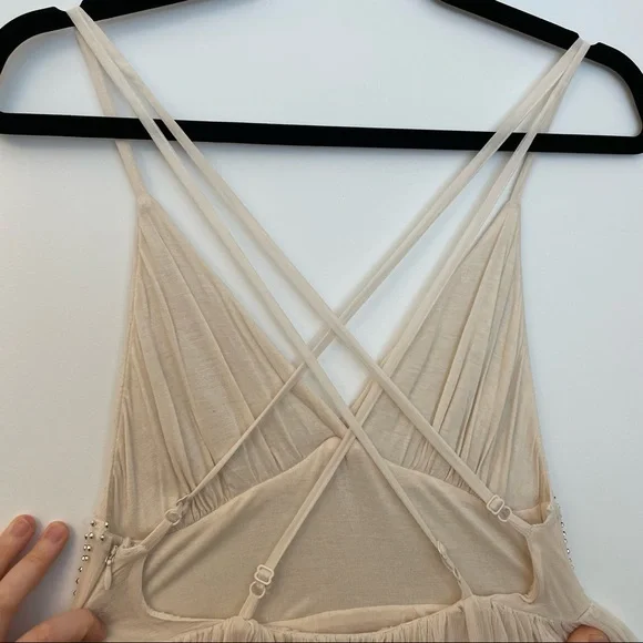 Free People Cream sparkly mini dress with a strappy back!
Size: 2 Never worn! - Picture 4 of 4